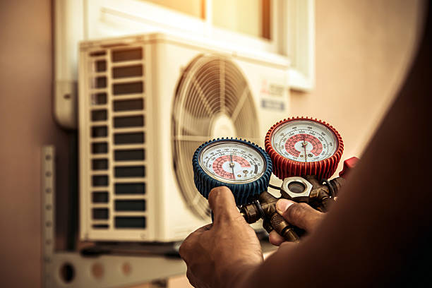 Professional Hvac technician working in Jbphh, HI